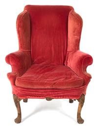A George II Style Carved Walnut Wing Chair Height 46 inches. — LATE 18TH CENTURY