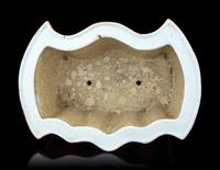 A Pair of Gilt Highlighted Coral-Red Ground Bat-Form Porcelain Planters