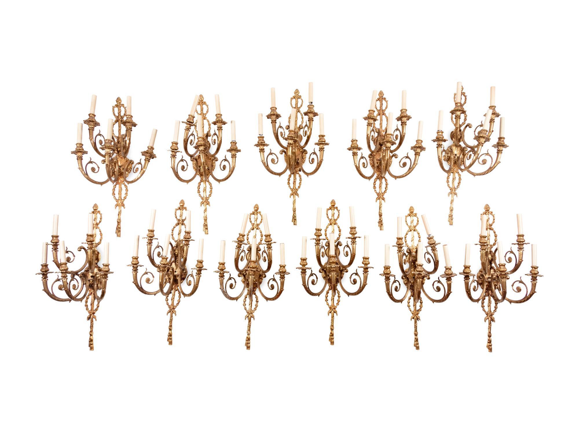 A Set of Eleven Louis XVI Style Gilt Bronze Five-Light Sconces