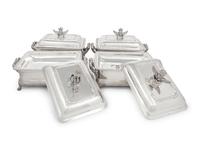 A Set of Four George III Silver and Silver-Plate Chafing Dishes