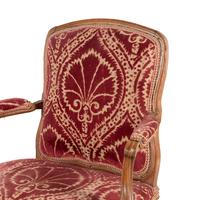 A Set of Three Louis XV Beechwood Fauteuils