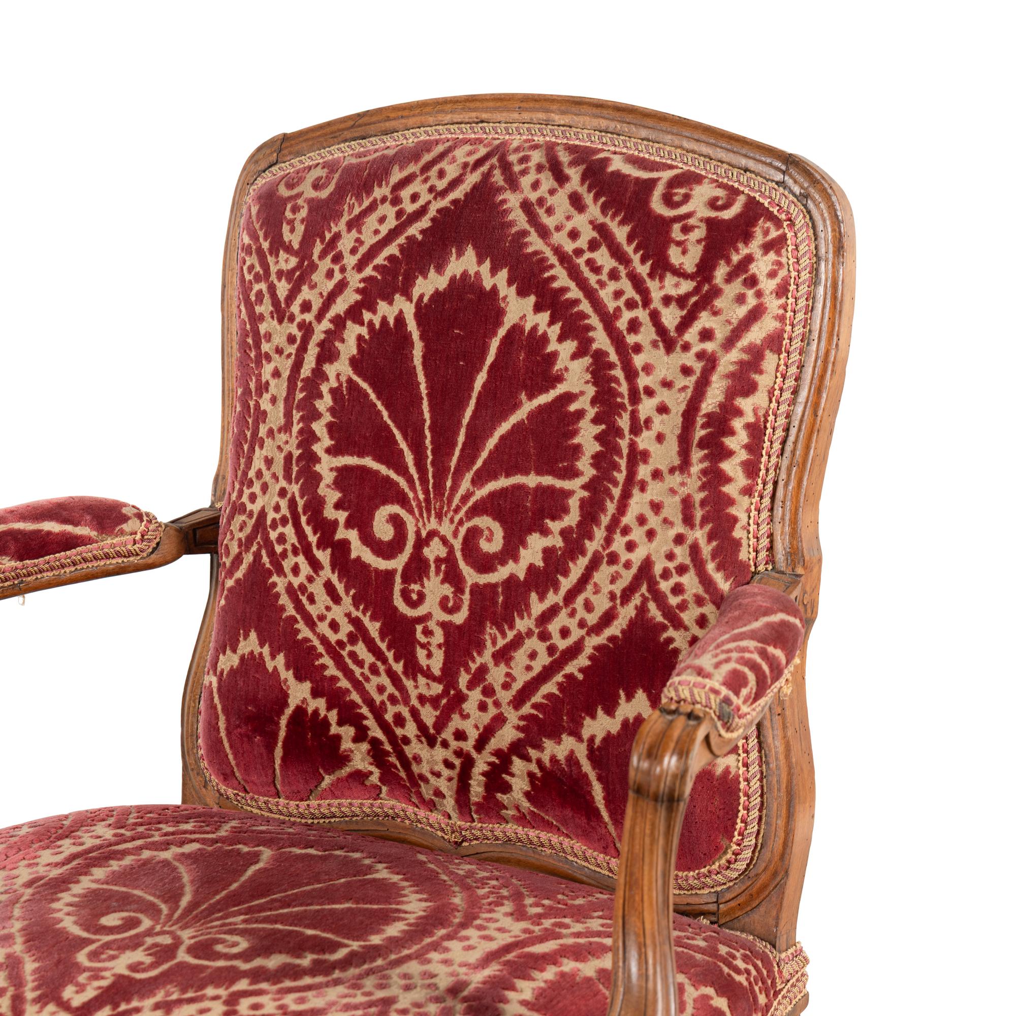 A Set of Three Louis XV Beechwood Fauteuils