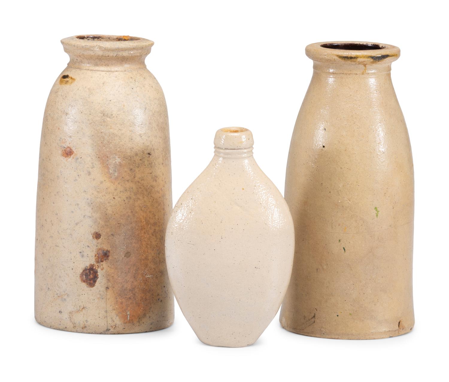 Seven Stoneware Vessels and a Six-Gallon Redware Crock
