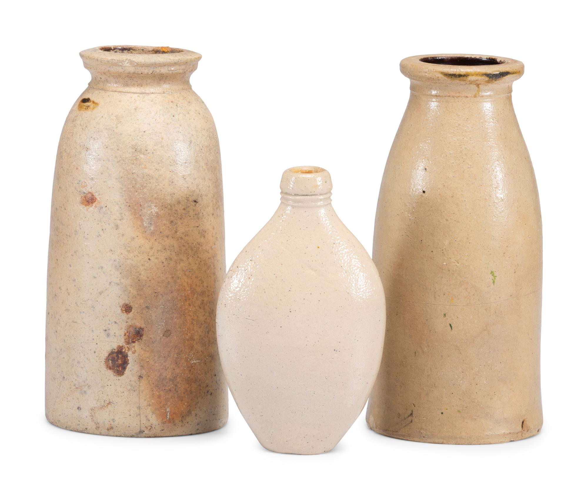 Seven Stoneware Vessels and a Six-Gallon Redware Crock
