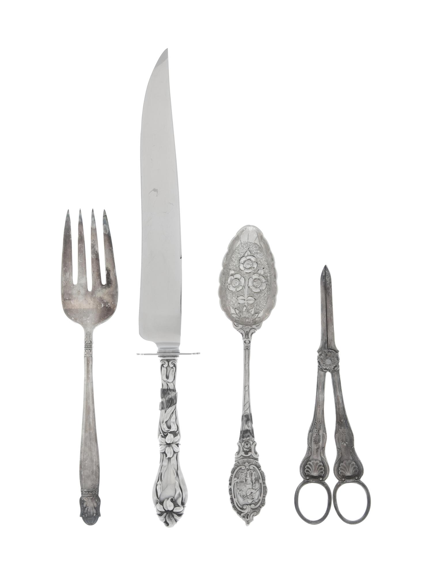 A Collection of Silver and Silver-Plate Flatware Articles