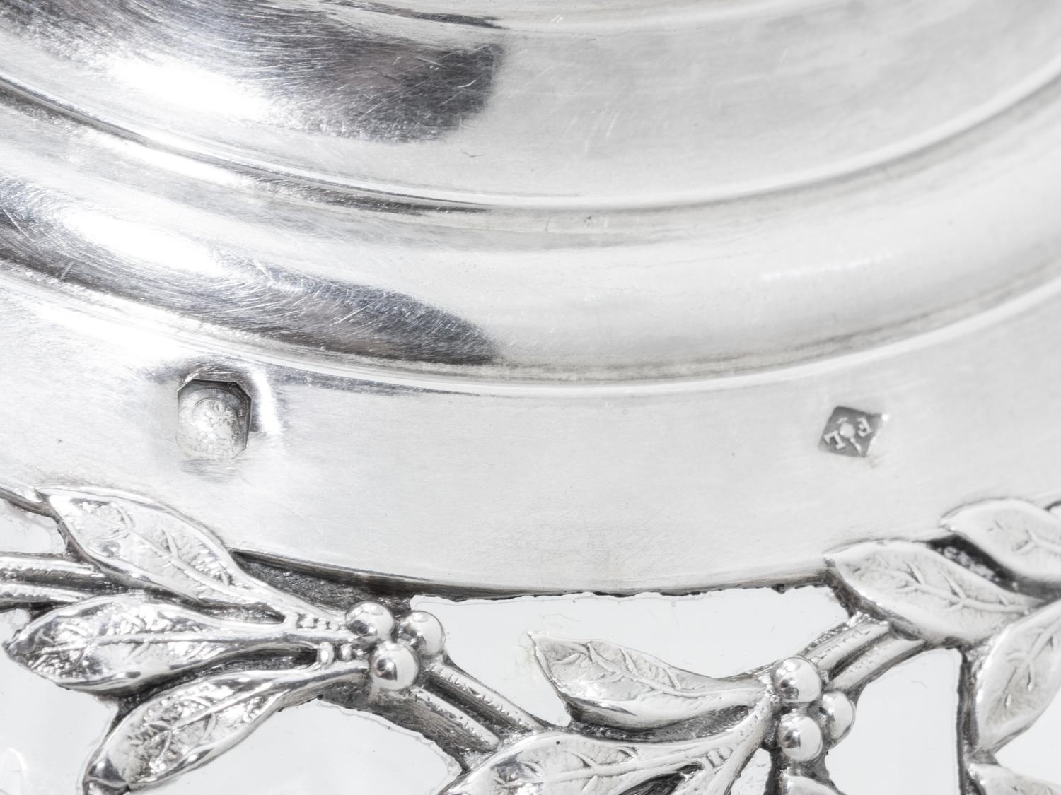 A Pair of French Silver and Glass Claret Jugs