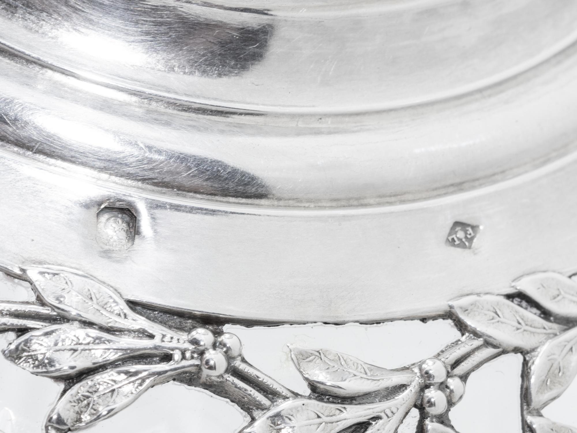 A Pair of French Silver and Glass Claret Jugs