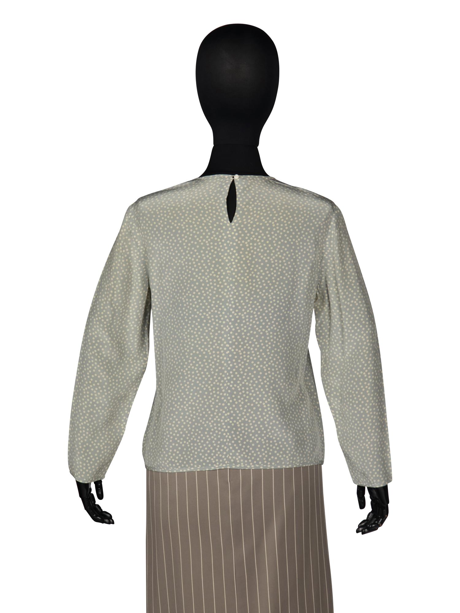 Two Skirt Suits and Two Blouses by Geoffrey Beene