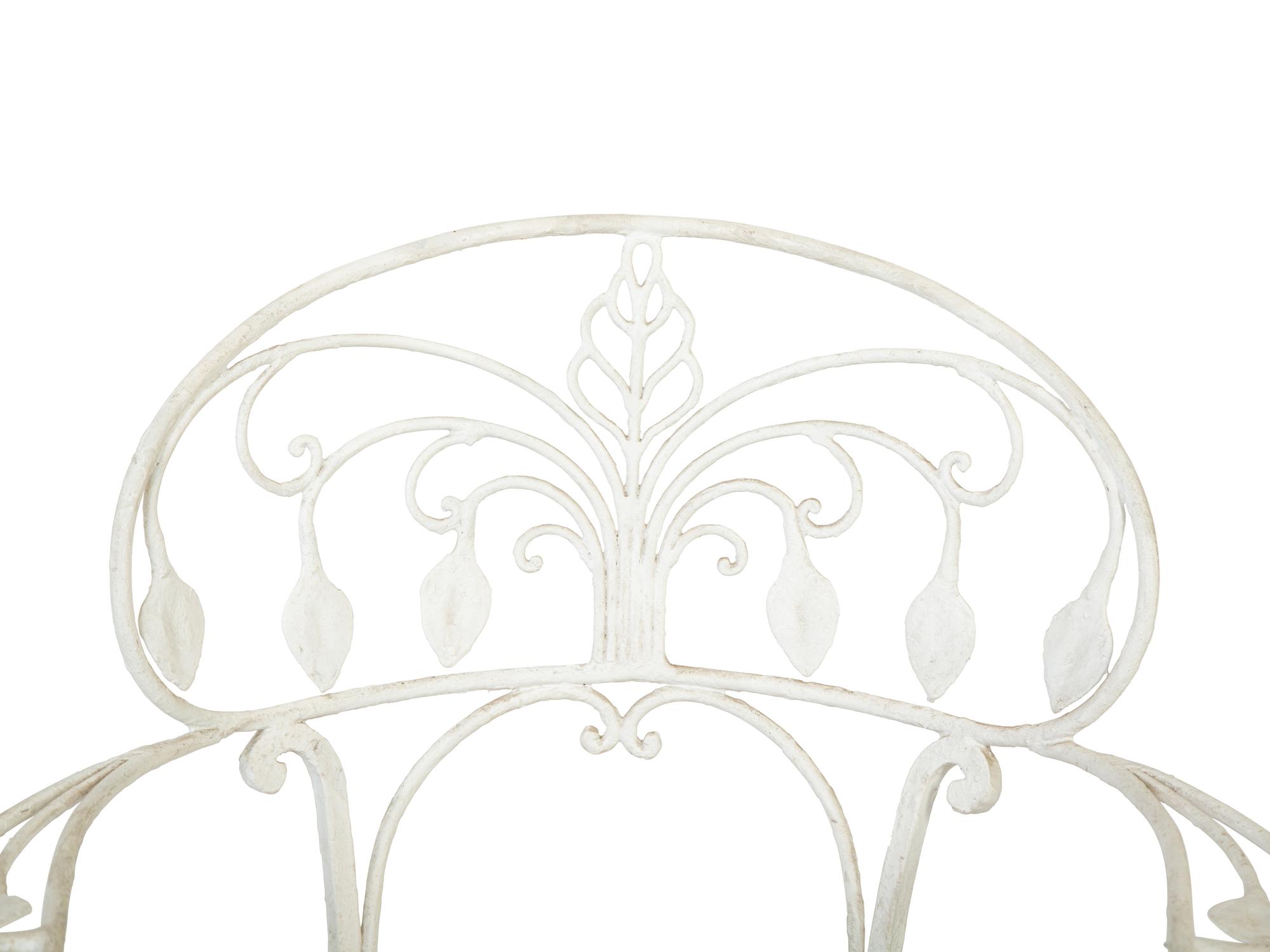 A Pair of White Painted Iron Garden Chairs — 20TH CENTURY