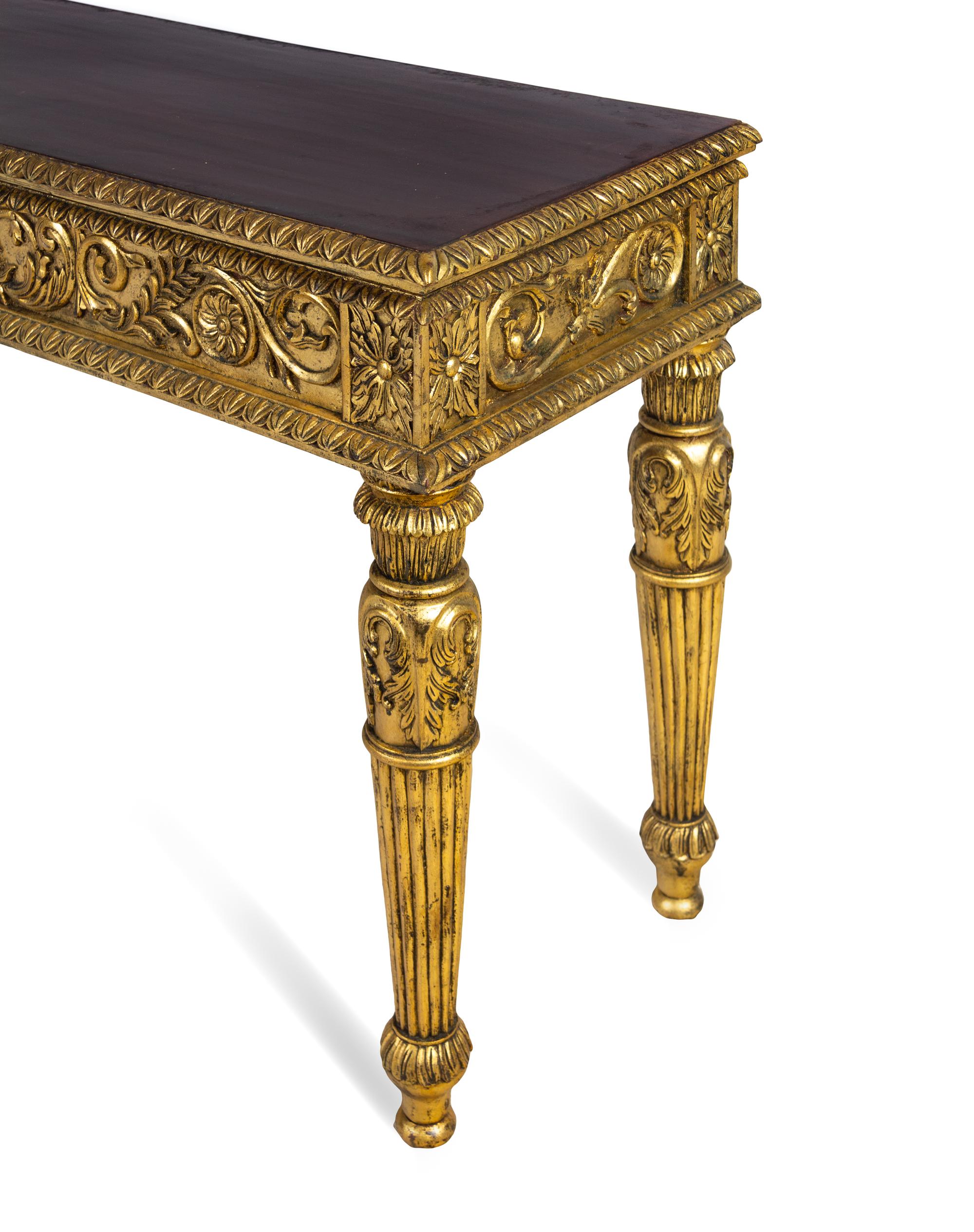 An Italian Rococo Style Giltwood Marble-Top Console Table