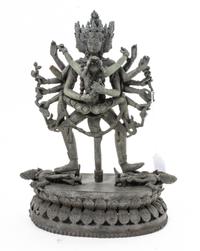 A Nepalese Cast Metal Figural Group Height 12 inches. — 20TH CENTURY