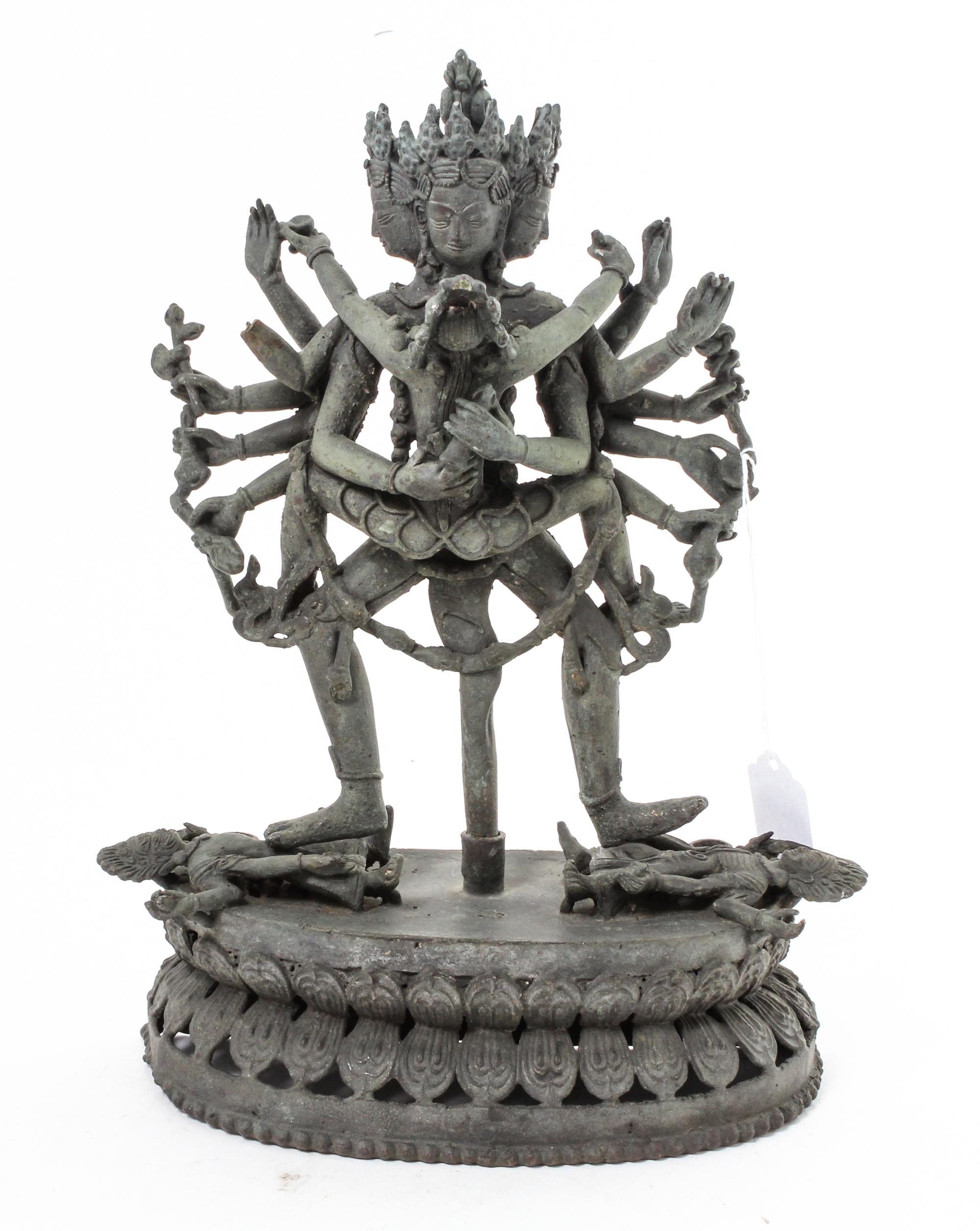 A Nepalese Cast Metal Figural Group Height 12 inches. — 20TH CENTURY