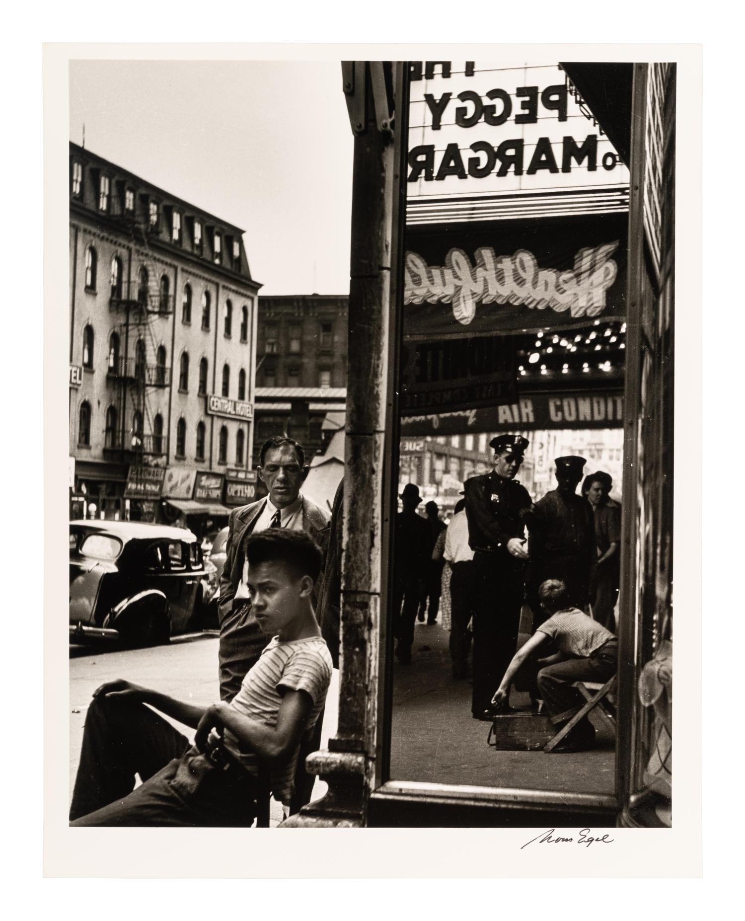 Morris Engel (1918-2005) Shoeshine Boy with Cop, 14th Street, New York City, 1947
