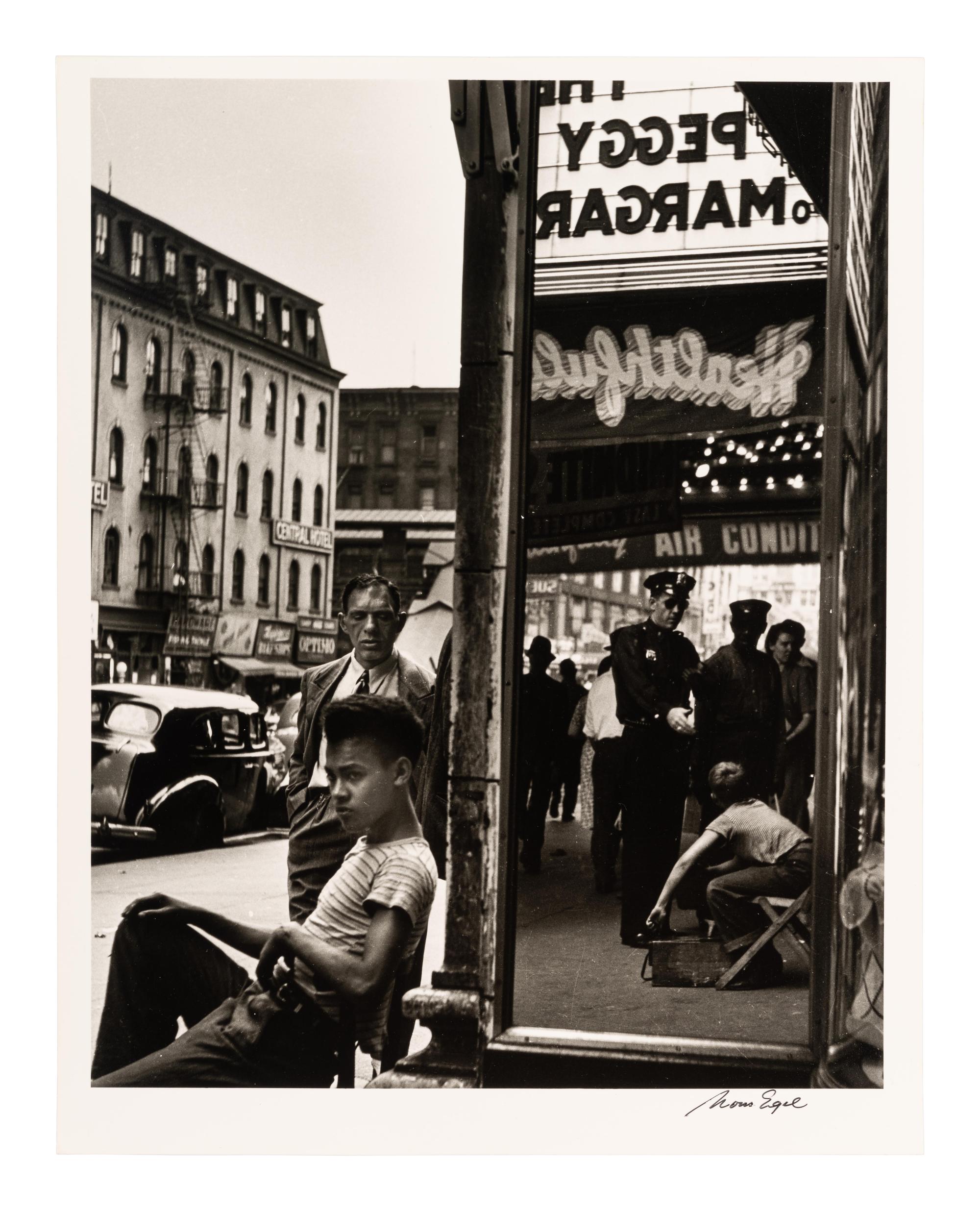 Morris Engel (1918-2005) Shoeshine Boy with Cop, 14th Street, New York City, 1947