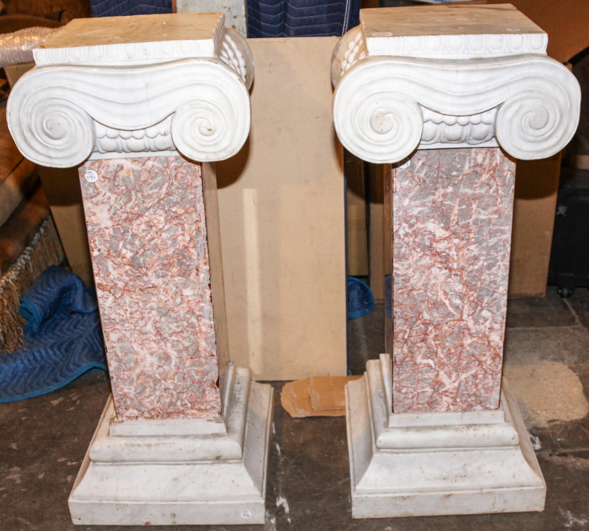 A Pair of Neoclassical Marble Columns. Height 42 inches.