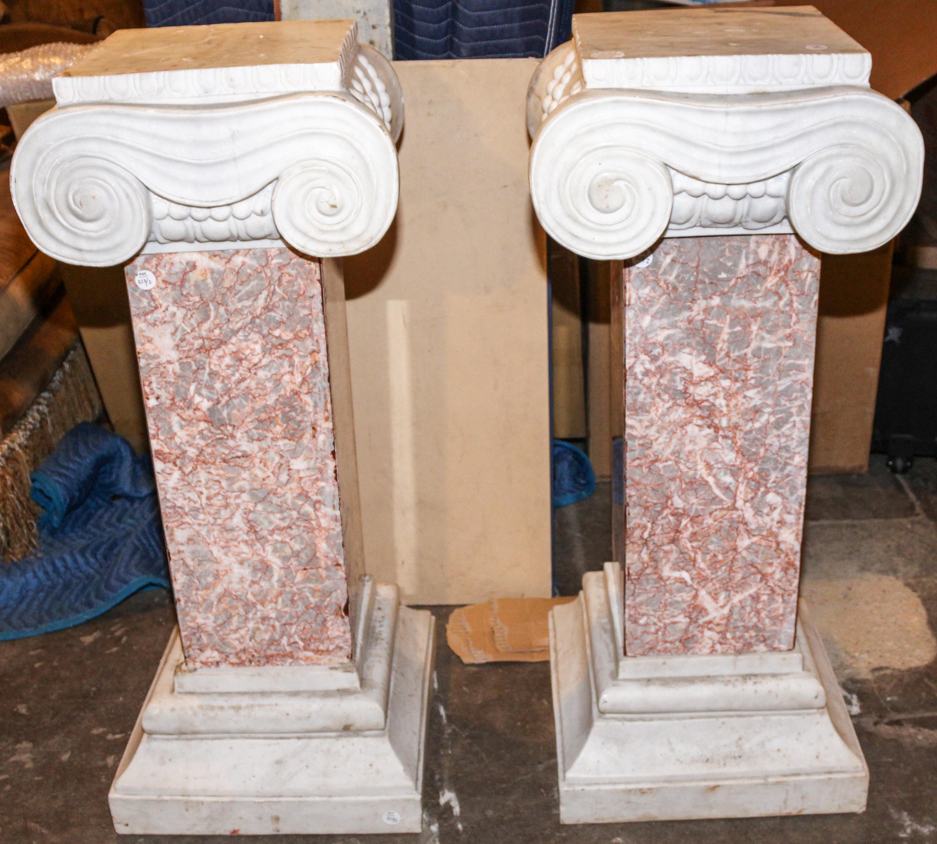 A Pair of Neoclassical Marble Columns. Height 42 inches.