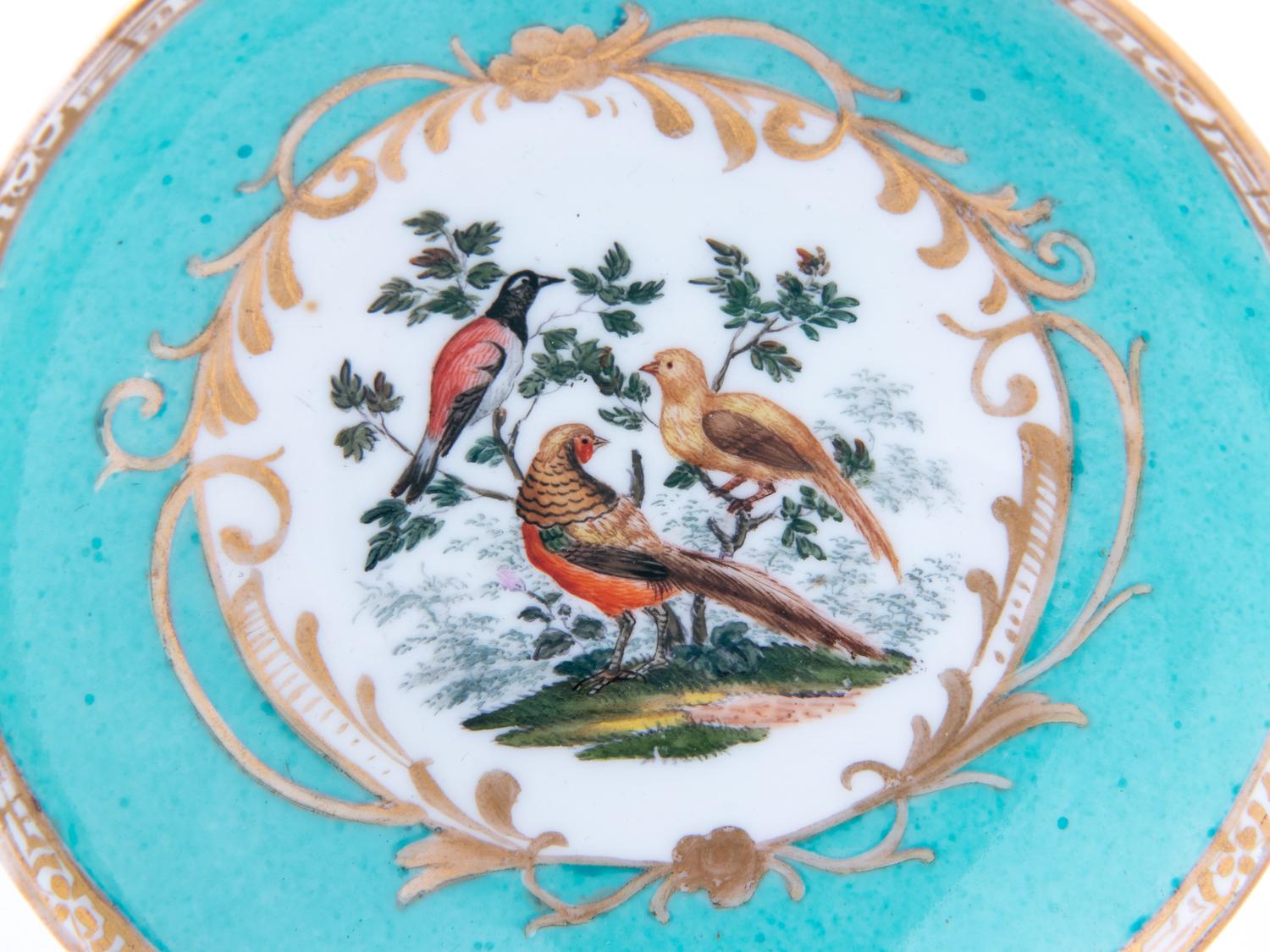 Three Meissen Painted and Parcel Gilt Porcelain Cup and Saucer Sets, a Covered Cup and Two Spoons