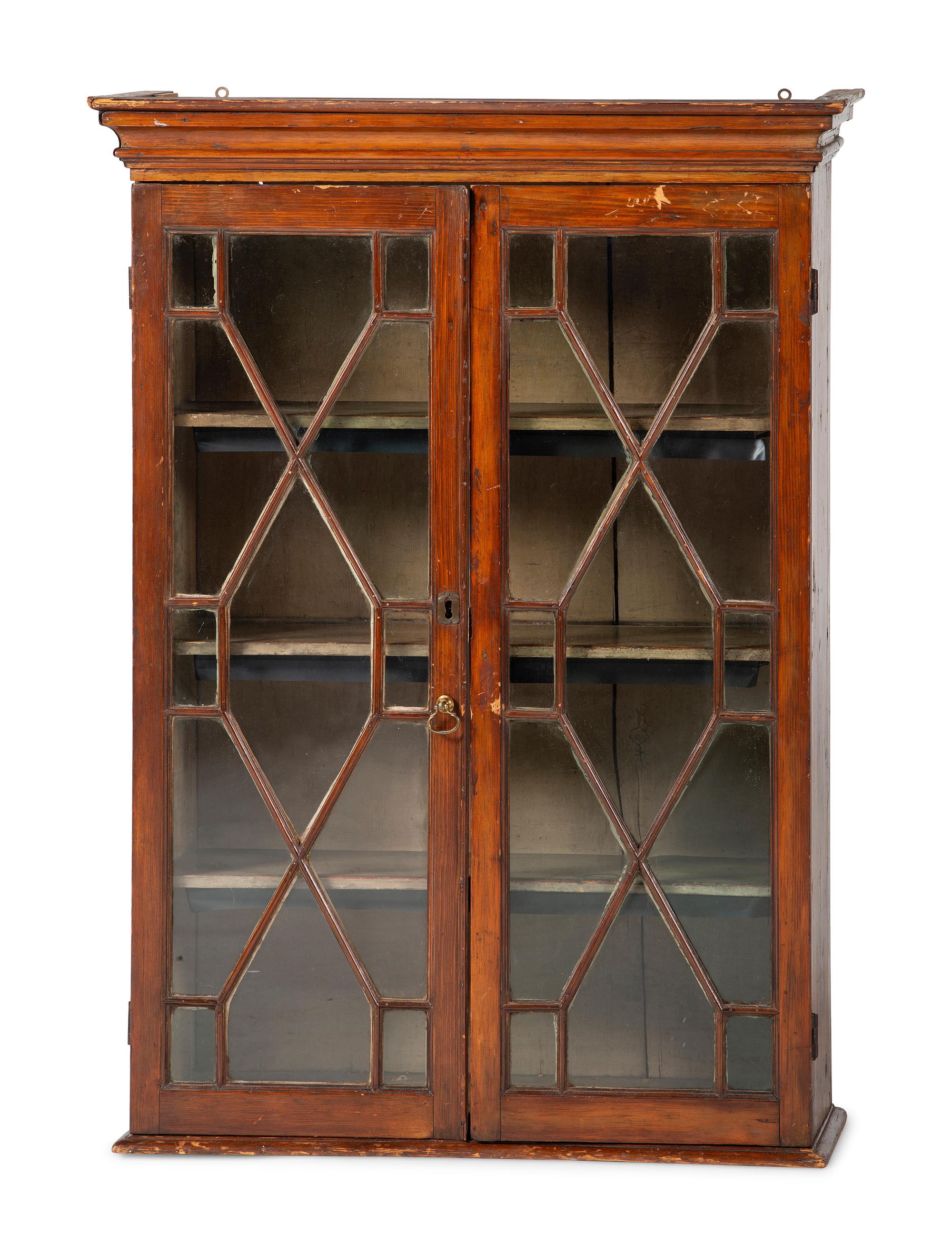 A Country Chippendale Stained Pine Hanging Cabinet