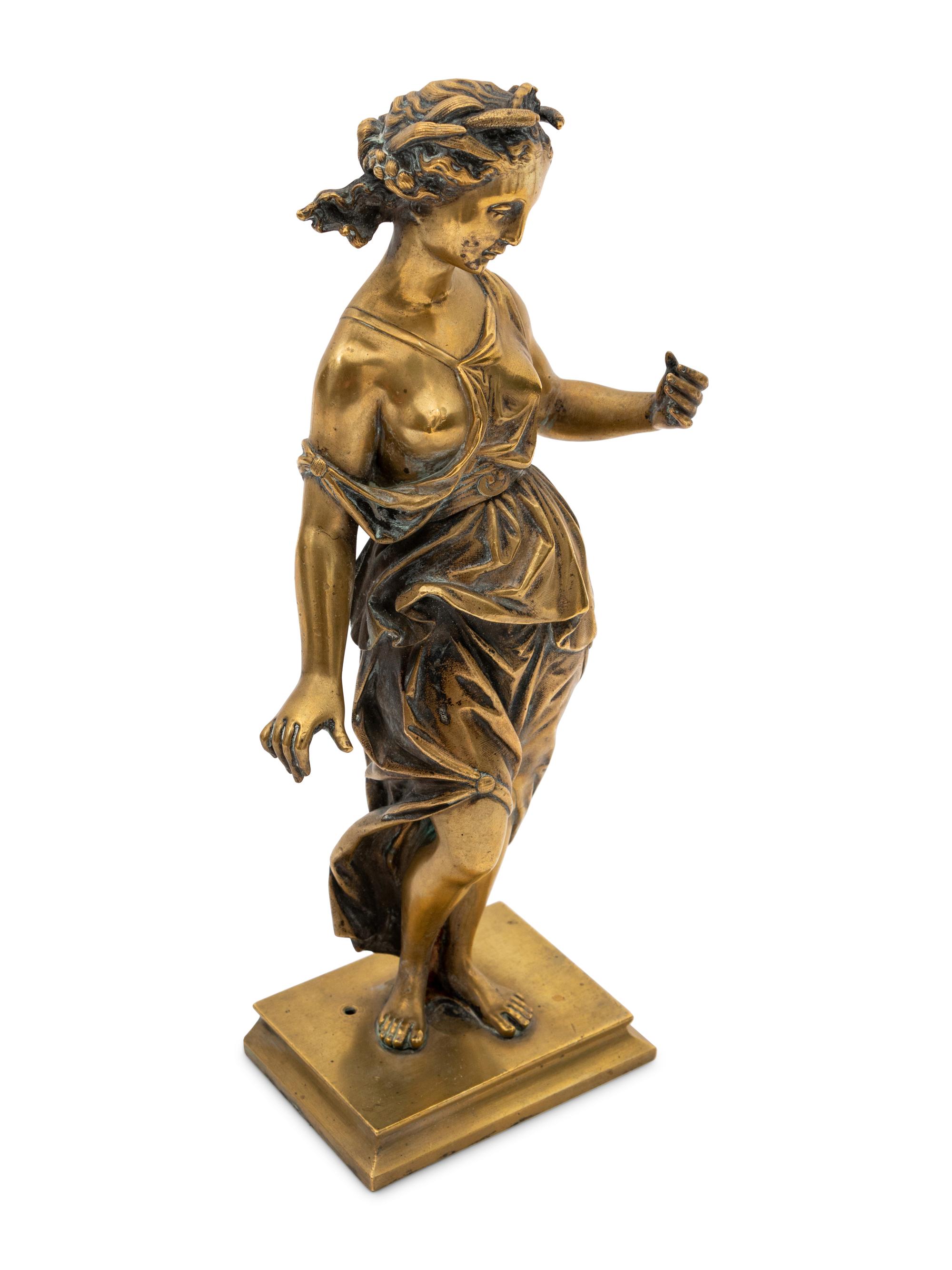 A Gilt Bronze Figure of a Muse