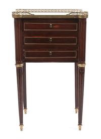 A French Brass Mounted Mahogany Table en Chiffonniere Height 31 x width 18 1/2 x depth 14 1/4 inches.