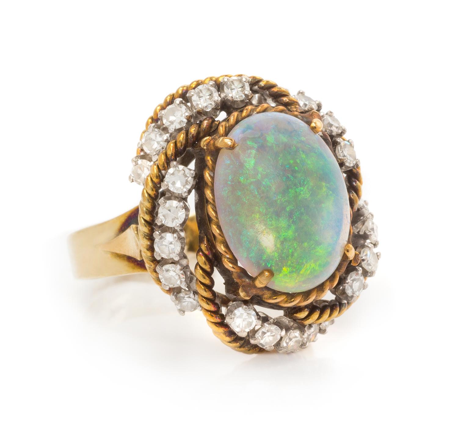 A Yellow Gold, Opal and Diamond Ring, 6.20 dwts.
