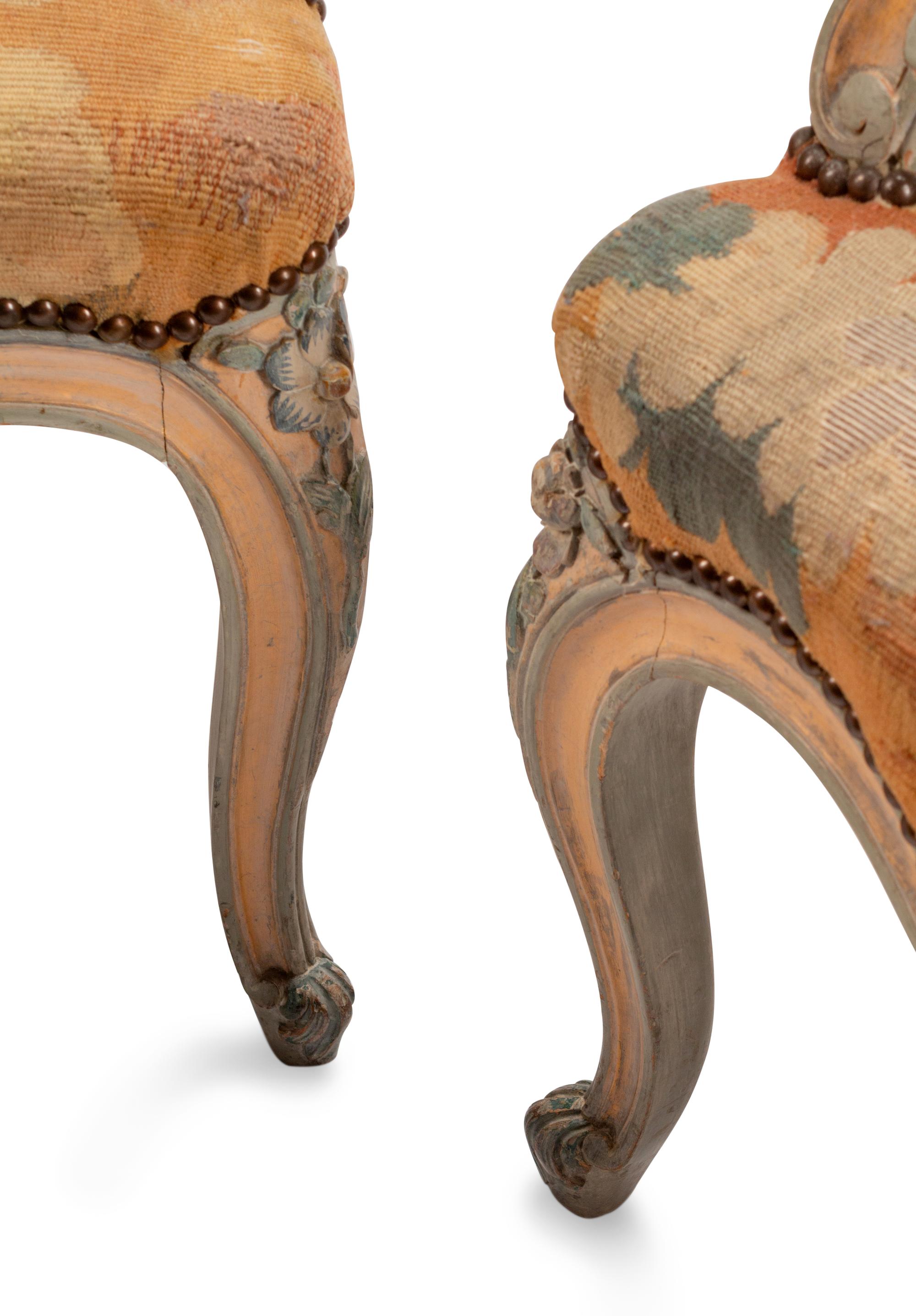 A Pair of Louis XV Style Tapestry-Upholstered and Painted Fauteuils — 19TH CENTURY
