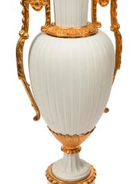A Pair of Gilt Metal Mounted Bisque Porcelain Lamps