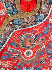 A Chinese Red Ground Kesi Silk Dragon Robe, Jifu, 19th Century 清晚期 紅地緙絲龍紋吉服