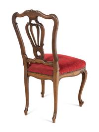 A Set of Five Louis XV Style Carved Walnut Dining Chairs