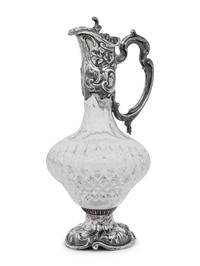 A Portuguese Silver Mounted Cut Glass Claret Jug