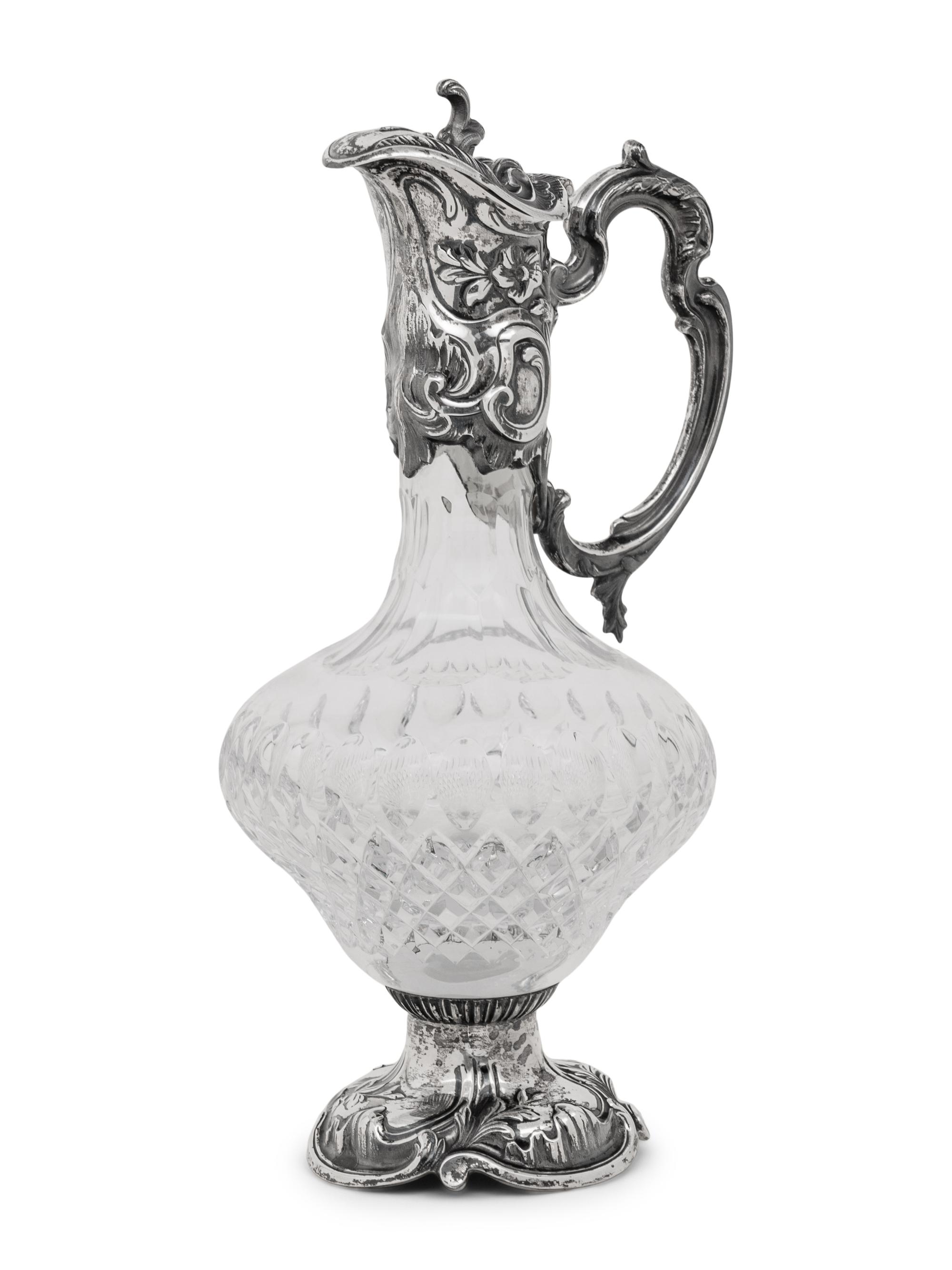 A Portuguese Silver Mounted Cut Glass Claret Jug