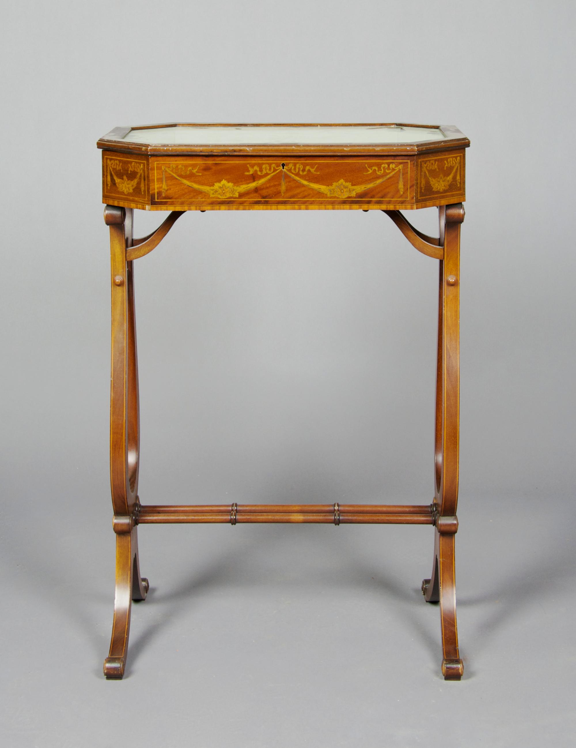 A Regency Style Marquetry Vitrine Table, Height 28 7/8 x width 19 3/4 x depth 13 7/8 inches.