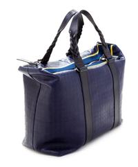 A Salvatore Ferragamo Navy Logo Embossed Leather Tote Bag, 11"H x 15"W x 7.25"D; Strap drop: 8".