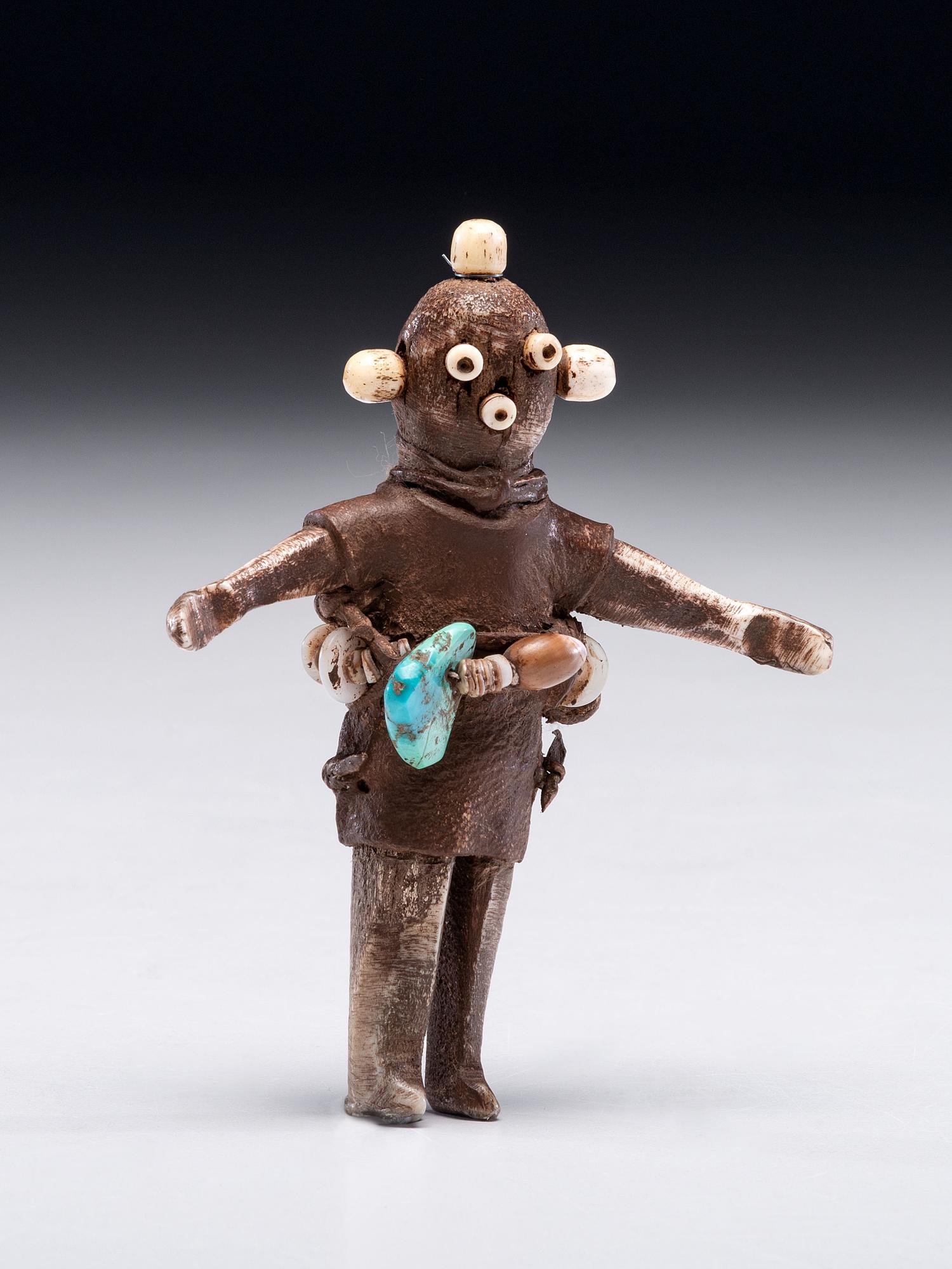 Carved Bone Figure, Mudhead