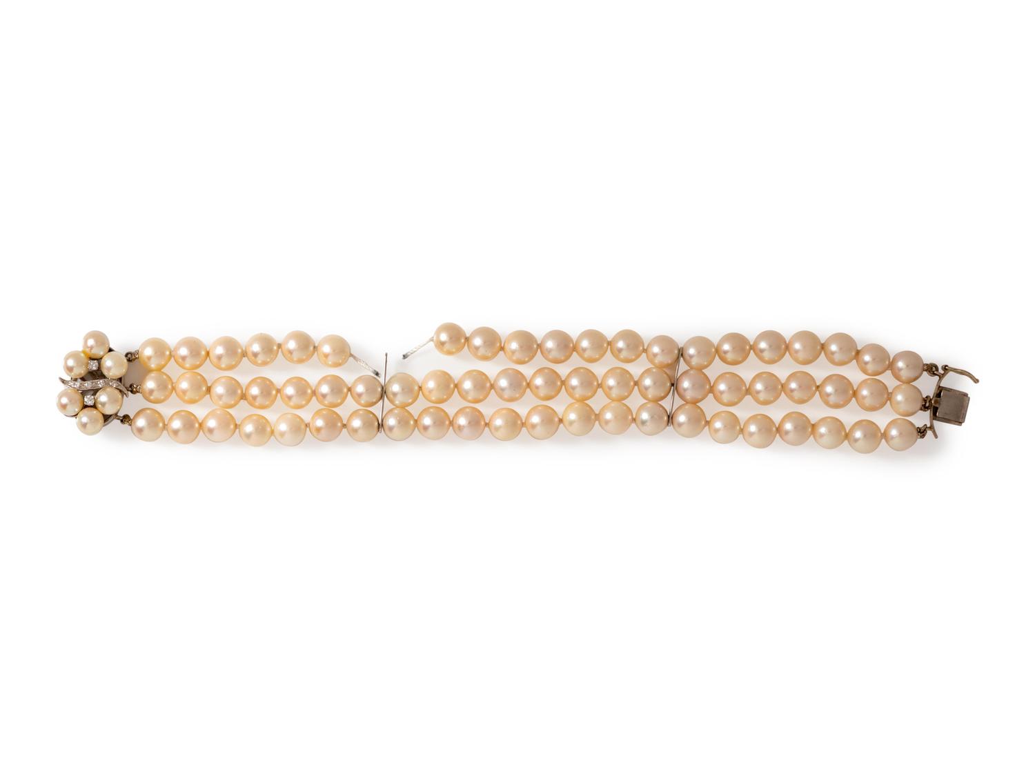 A 14 Karat White Gold, Diamond and Cultured Pearl Bracelet,
