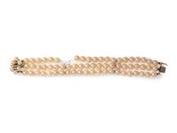 A 14 Karat White Gold, Diamond and Cultured Pearl Bracelet,