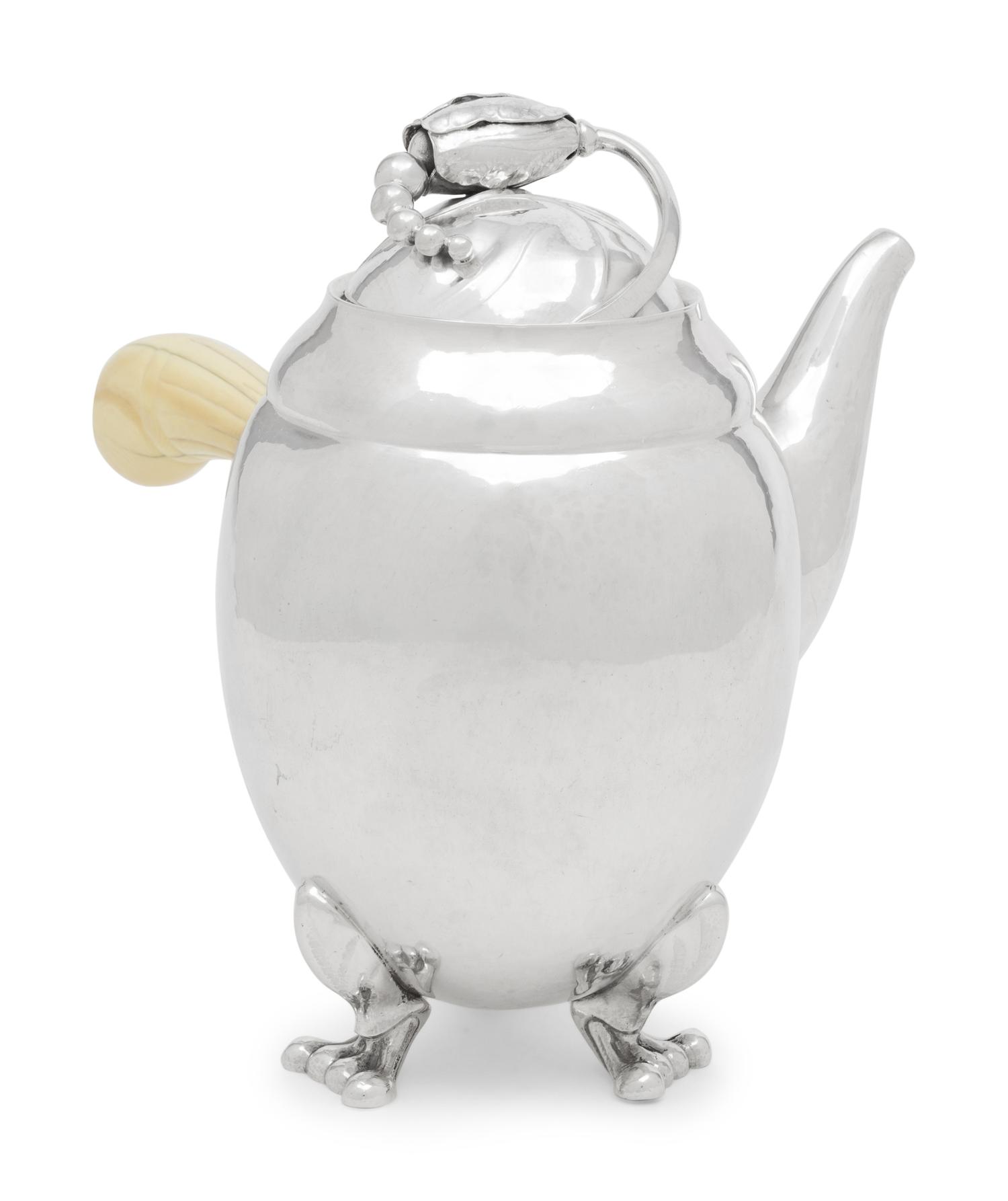 A Georg Jensen Blossom Hammered Silver Chocolate Pot