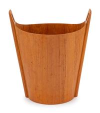A Norwood Carved Teak Wastebasket