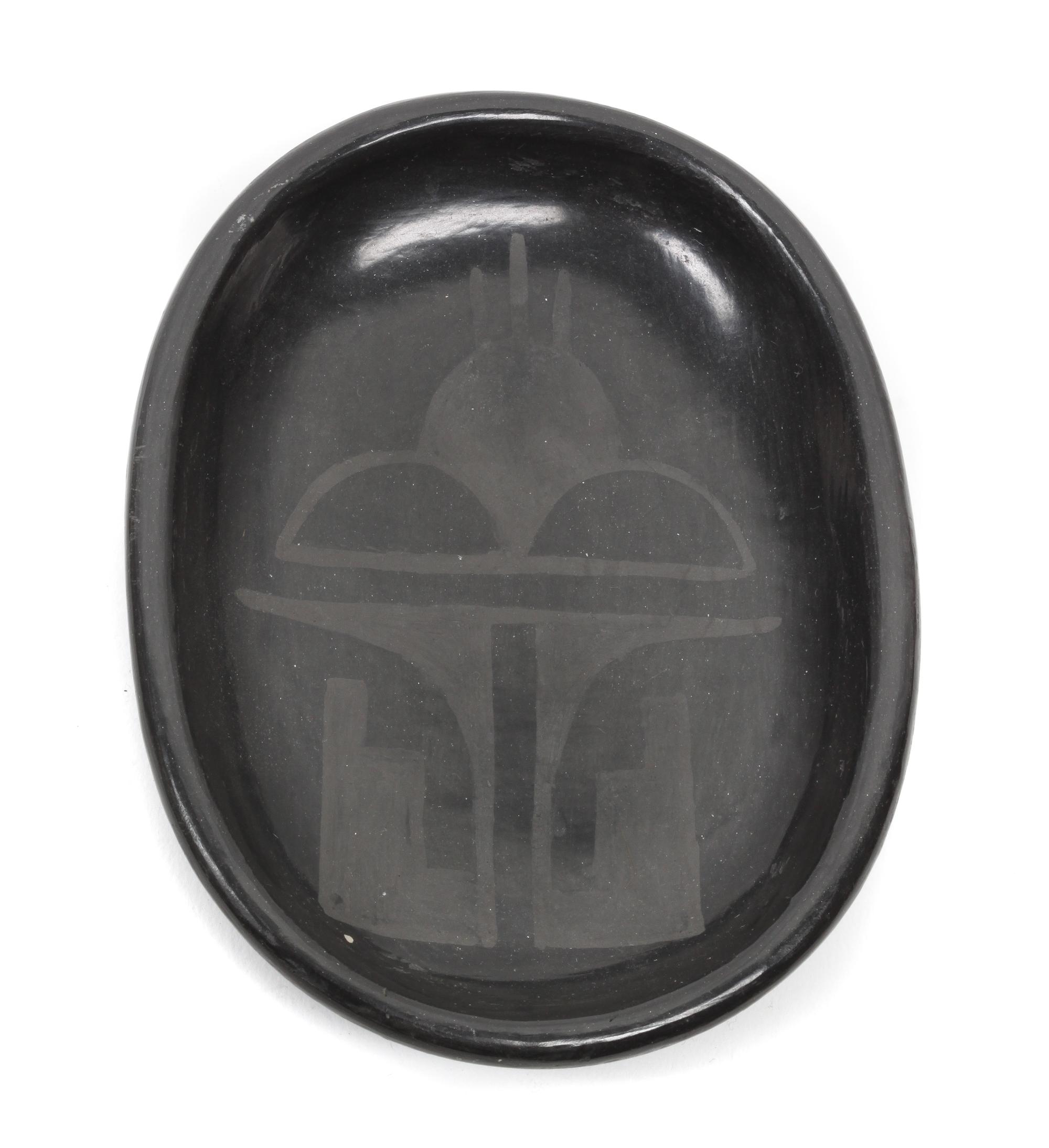 Rose Gonzales (1900-1989), San Ildefonso Blackware Plate Length 5 1/4 x width 4 inches.