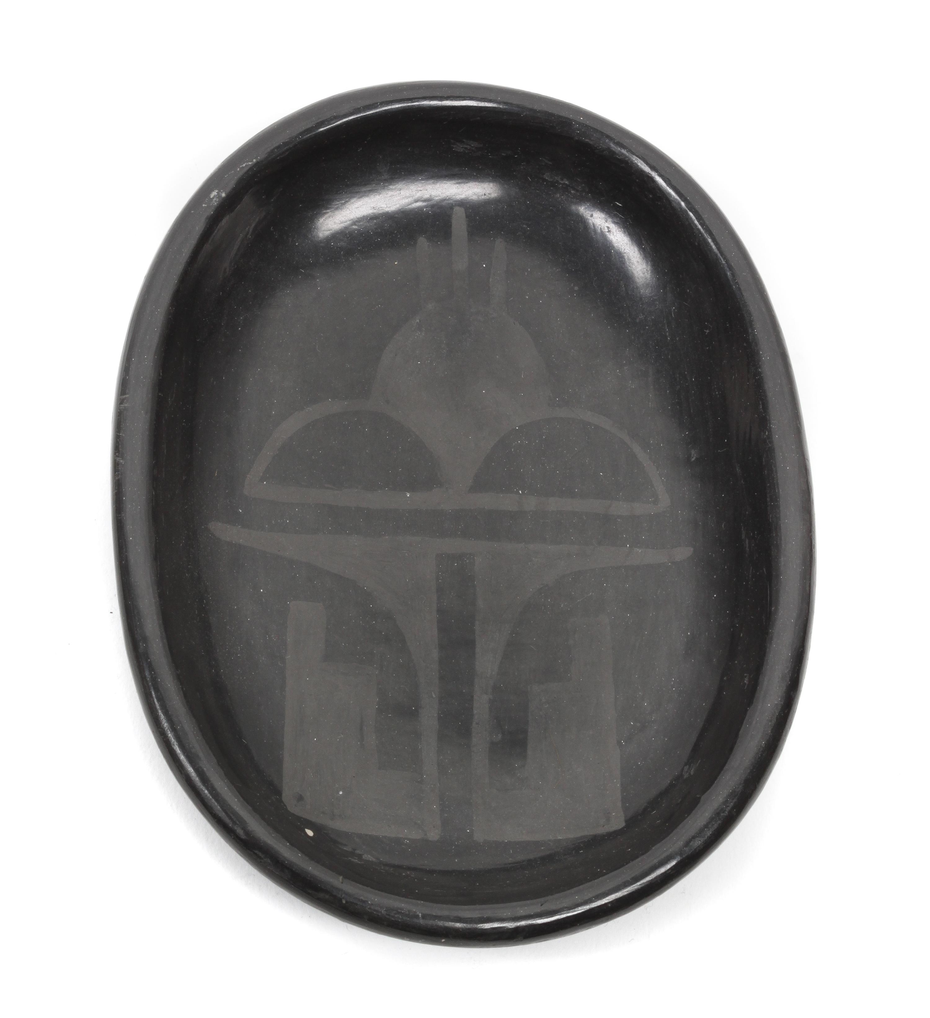 Rose Gonzales (1900-1989), San Ildefonso Blackware Plate Length 5 1/4 x width 4 inches.