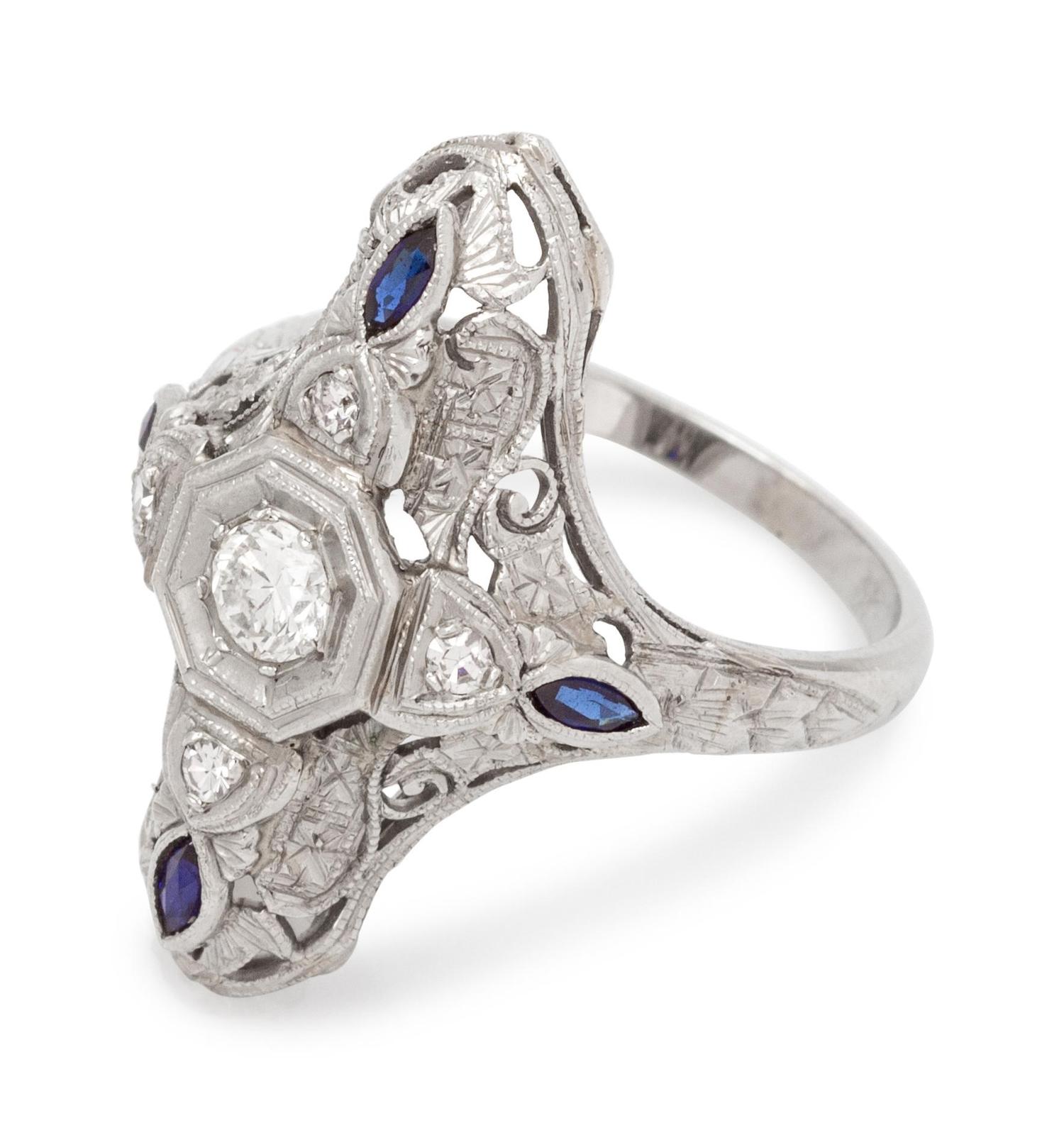 An 18 Karat White Gold, Diamond and Sapphire Ring,