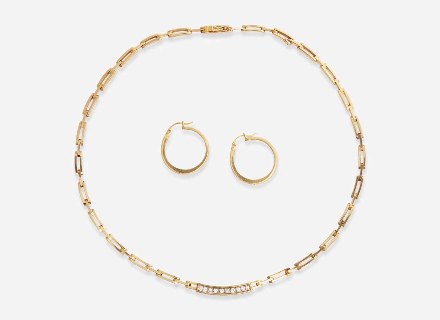 A 14K Yellow Gold and Diamond Necklace and Matching Earrings