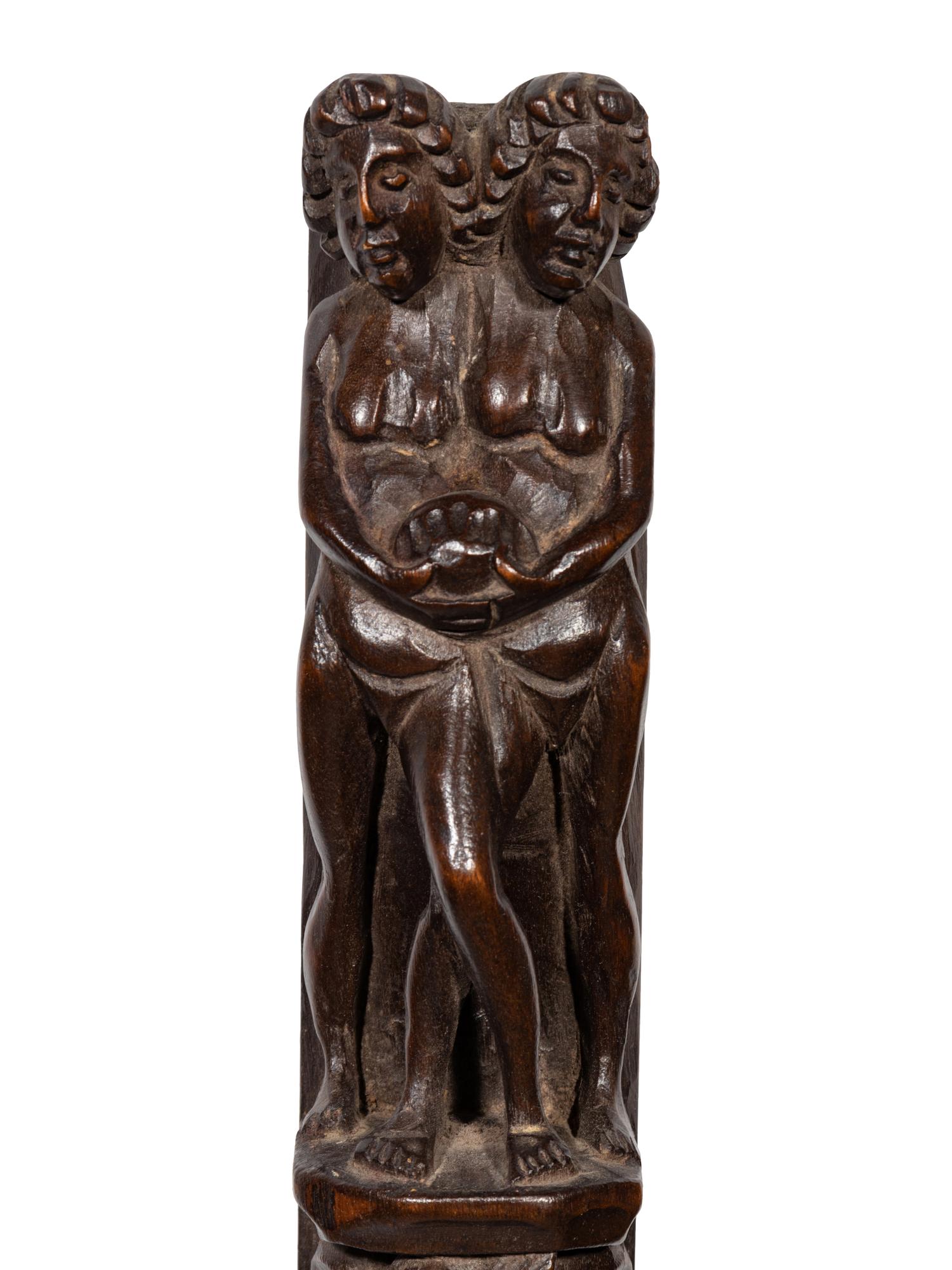 A Pair of Continental Carved Figural Pilasters