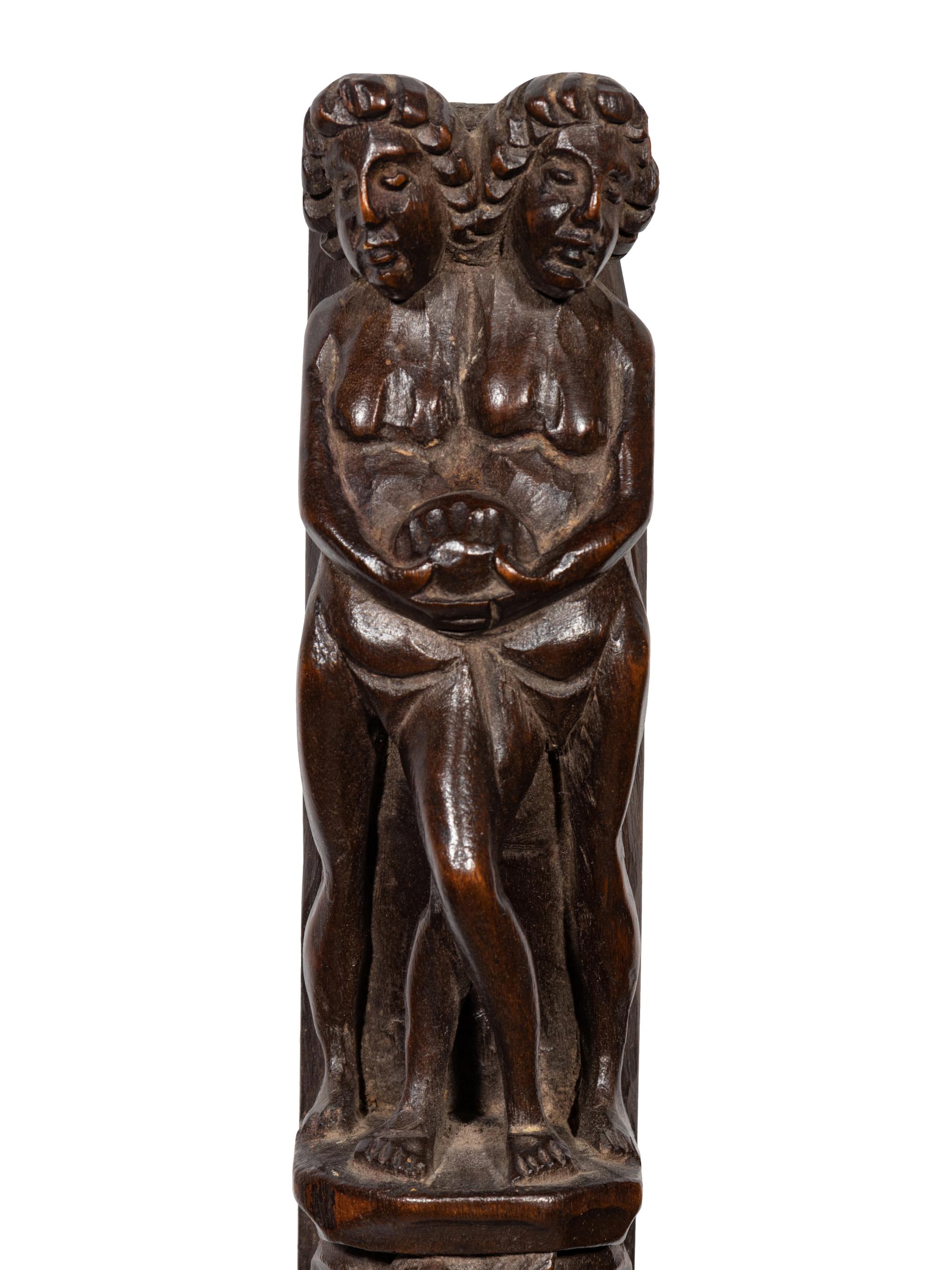 A Pair of Continental Carved Figural Pilasters