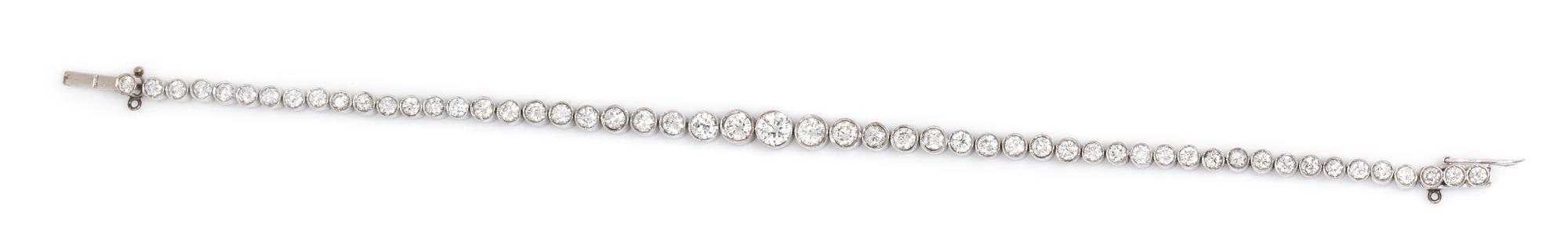 A Platinum and Diamond Graduated Line Bracelet, 9.70 dwts.