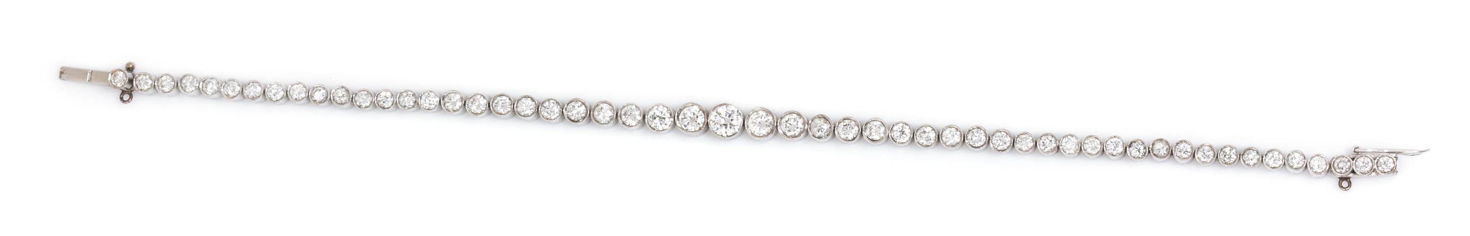 A Platinum and Diamond Graduated Line Bracelet, 9.70 dwts.