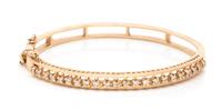 A Yellow Gold and Diamond Bangle Bracelet,