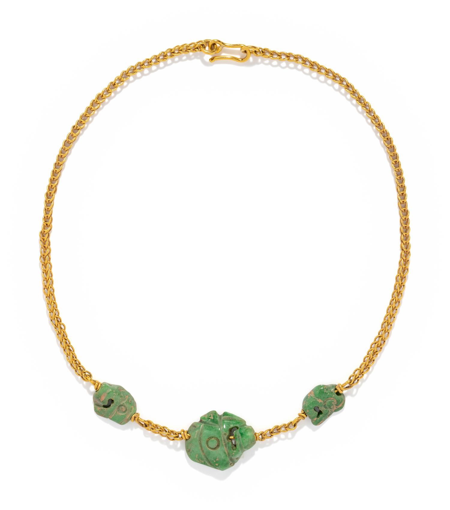 Three Maya Jade Parrot Pendants — Strung on a gold necklace