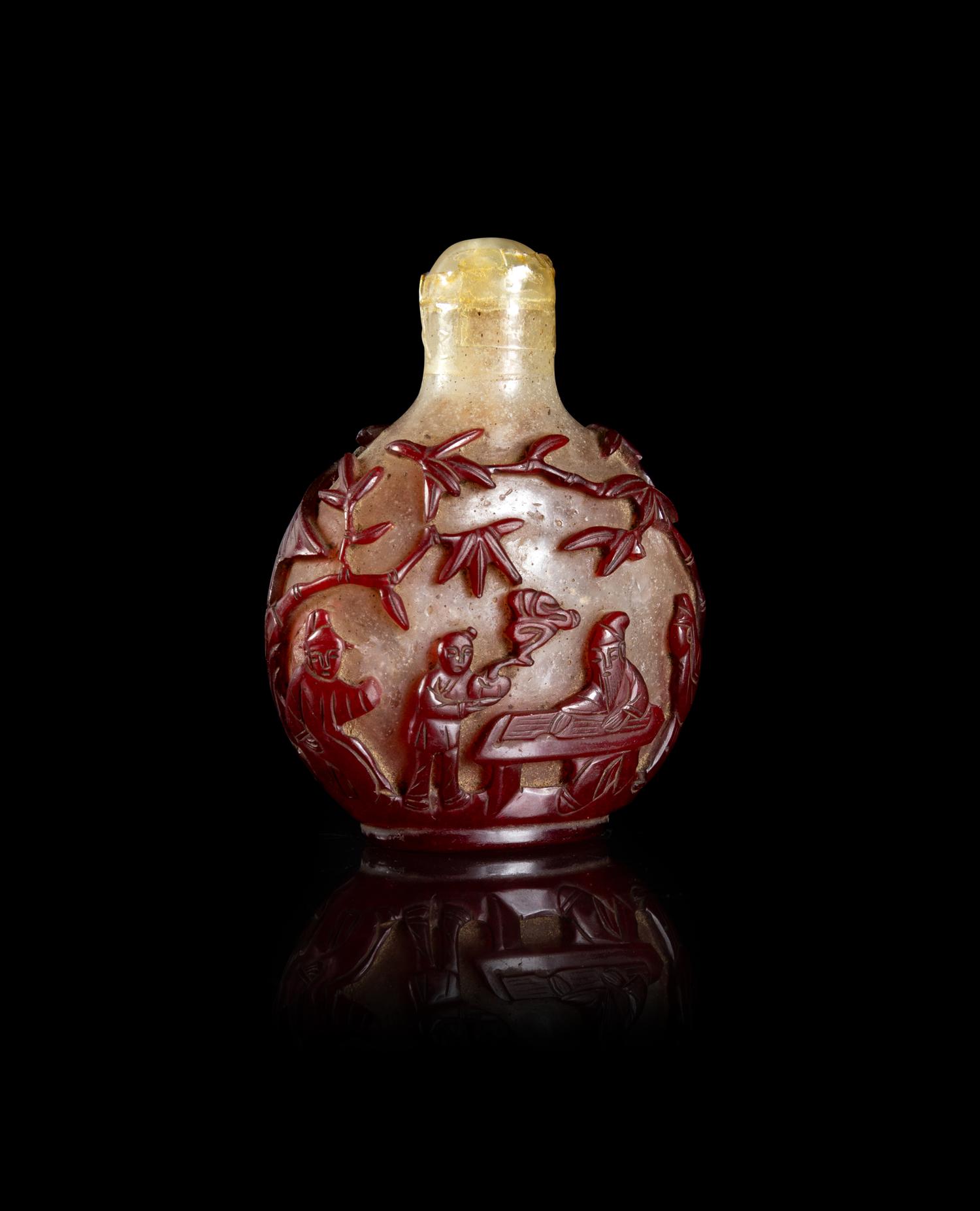 A Chinese Red Overlay Snowflake Ground Glass Snuff Bottle