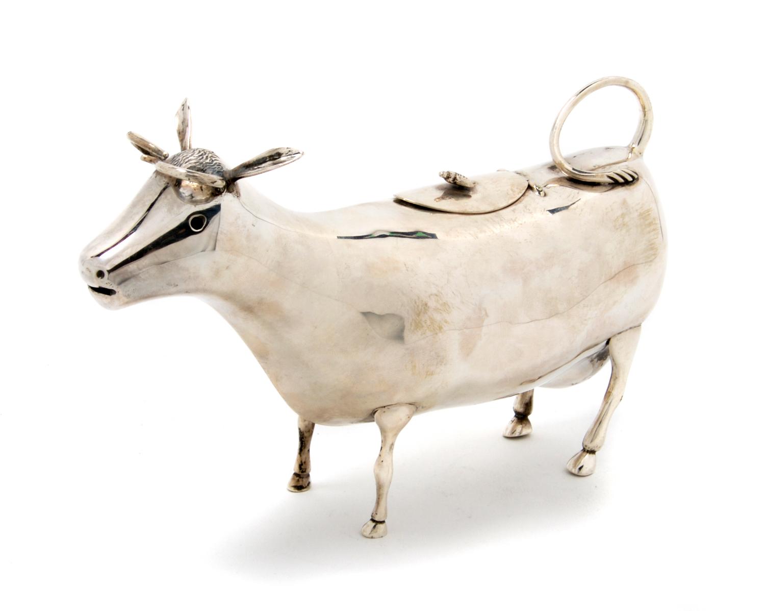 A Dutch Silver Cow Creamer, Length 8 inches.